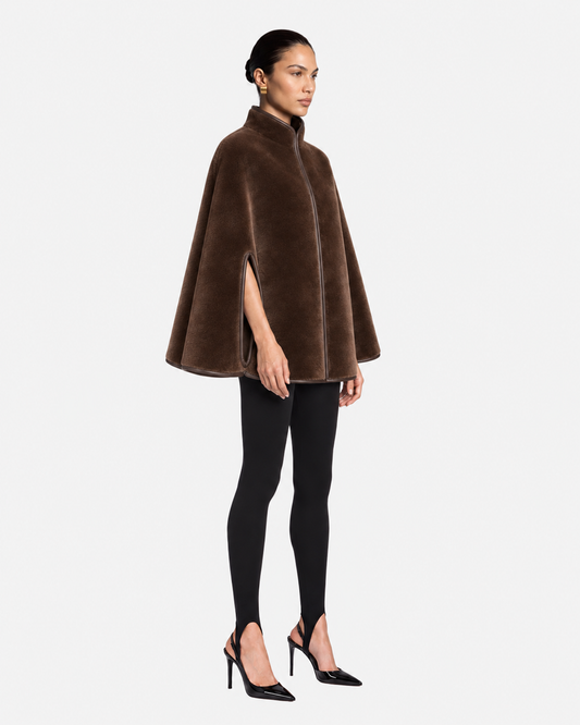 Noelle Merino Shearling Cape in Brown, model side view
